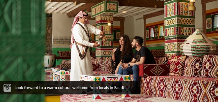 Cultural welcome from locals in Saudi